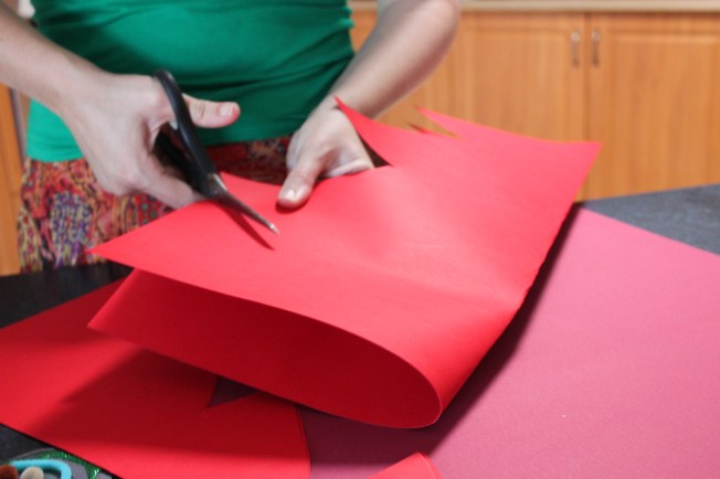 Fold over and cut out the tree to create a symmetrical shape.